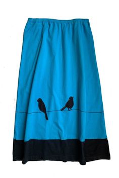 Long Skirts are made with high quality, up-cycled t-shirts. Freestyle sewn images are appliquéd on panels of various colors making each skirt unique and interesting.A fitted straight cut and mid-calf length is perfect for those looking for more coverage and a dressier style.  The long length and comfortable materials make this a skirt for all seasons.EACH SKIRT IS MADE TO ORDER AND UNIQUE.The colors and appliqué may be slightly different from the actual skirt pictured, but we will try to come as Casual Upcycled Cotton Skirt, Casual Cotton Upcycled Skirt, Casual Cotton Skirt With Upcycled Details, Applique Skirt, Cycling T Shirts, Cycling T-shirt, Dressy Fashion, Long Skirts, Philadelphia Pa