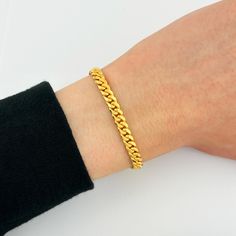 My popular 5mm Miami Cuban link bracelets are now available in solid 22k gold! This Cuban Link bracelet features solid gold links that are perfect for everyday wear and rocking that luxurious look. These Miami Cuban bracelets are also available in (SOLID) 14k yellow gold, 14k white gold, 14k rose gold, 18k yellow gold, and 22k gold! Mour & Co. is a reputable jewelry company that has been in the jewelry industry for MANY years. I deeply value all of my clients, therefore, I only provide you with the highest-quality jewelry and phenomenal customer service. All of my jewelry is crafted from real, genuine solid gold so it can be enjoyed for a lifetime without fading, tarnishing, or turning green. Orders are fulfilled within 1-2 business days ensuring a fast delivery--YOUR happiness is MY happi Classic 22k Gold Bracelets For Formal Occasions, Classic 22k Gold Bracelet For Formal Occasions, Luxury Gold Cuban Link Bracelet For Everyday, Classic 22k Yellow Gold Bracelets, Classic 22k Yellow Gold Bracelet, Gold Minimalist Cuban Link Bracelet For Formal Wear, Gold Minimalist Cuban Link Bracelet For Formal Occasions, Minimalist Gold Cuban Link Bracelet For Formal Wear, Classic 22k Gold Bracelets As A Gift