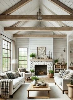 a living room filled with furniture and a fire place in the middle of a room