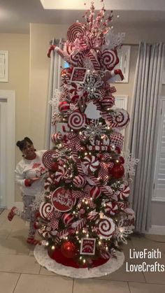 a christmas tree decorated with red and white candy canes