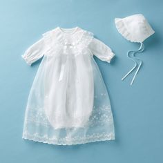 A gorgeous, pure white ceremony dress for those special moments meant to be cherished for a lifetime. Celebrate each and every of life's special occasions. Perfect for baby's first day out of the hospital, a birthday, a family portrait, or any moment to be adored. This 3-piece set contains an organdy coat delicately embellished with a beautiful emrboidery, two-way playsuit, and baby bonnet. Complete the look with our ceremony bib, shoes, socks, or afghan. - Genderless design - Inside two-way pla Angel Baby Gowns, White Ceremony, Ceremony Dresses, Baby Gown, The Hospital, Little Dresses, Beautiful Embroidery, Family Portrait, Pure White