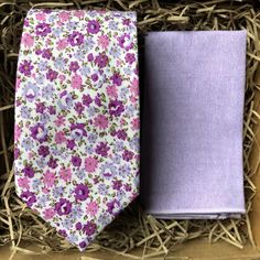 The White Lavender: 6cm wide necktie and matching pocket square in Cotton. Also available in 6cm skinny tie. This is a lavender floral men's tie and pocket square - perfect for weddings. Each item can be bought separately and we offer free shipping within the UK or a standard WorldWide shipping cost of £5.99 to many countries outside of the UK including the US. We also offer a free handwritten gift tag service - just leave the wording that you would like on the gift tag in the notes from buyer.  If you choose 'gift wrapping' we will send your item beautifully wrapped in a cardboard box with string and a gift tag with your message. We can also make all of our ties in children's sizes. Dimensions of tie: Tie width: 6cm   Tie length: 147cm   We offer a set of pre-made ties and pocket squares. Pocket Square Rules, Pocket Square Styles, Pocket Square Pattern, Lavender Tie, Pocket Square Wedding, Floral Necktie, Groomsmen Ties, Wedding Tie, White Lavender