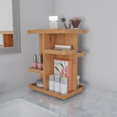 a bathroom counter with various items on it and a mirror in the corner behind it