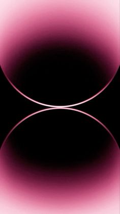 an abstract pink and black background with two circles in the center that appear to be overlapping