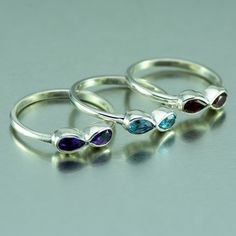 Small gemstone infinity rings. A plain sterling silver infinity ring set with the gemstone of your choice, Amethyst, Garnet or Blue Topaz The meaning behind infinity jewellery is actually quite beautiful - it symbolizes eternity, empowerment, and everlasting love. So this little ring is the perfect gift for that special person in your life! All of my jewellery is tested and hallmarked here in Spain under EU law, to make sure the silver is 92.5% sterling silver. So you can be fully confident that Silversmith Rings, Silver Infinity Ring, Infinity Jewelry, Infinity Ring, Multi Stone Ring, Silver Jewellery, Pear Shape, Java, Stone Rings