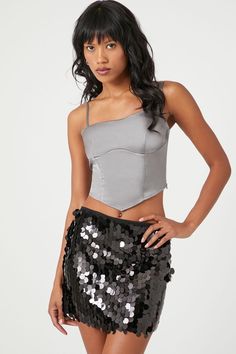 Knit mini skirt featuring allover sequin embellishments, concealed back zipper, metallic finish, and - line silhouette. | 100% polyester | Hand wash cold | Model is 5'9" and wearing Small | Sequin - line Mini Skirt Fitted Short Length Tops For Party, Fitted Short Length Party Tops, Fitted Sequin Tops From Forever 21, Forever 21 Fitted Sequin Tops, Forever 21 Mini Length Skirt For Party, Forever 21 Mini Skirt For Party, Forever 21 Mini Skirt For Summer Party, Line Silhouette, Knit Mini Skirt