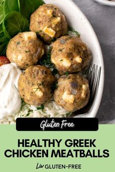 healthy greek meatballs on top of white rice in a bowl with spinach leaves