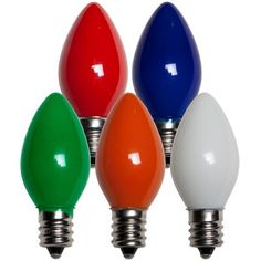 four different colored light bulbs on white background