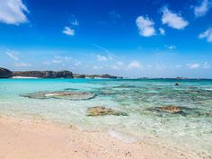 the water is crystal blue and clear on this beach