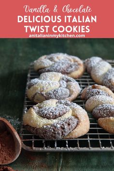 chocolate delicious italian twist cookies on a cooling rack with powdered sugar in the background