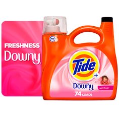 tide and downy laundry detergents on white background