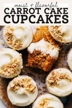 carrot cake cupcakes with white frosting on top