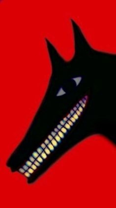 a black dog with glowing eyes and a red background