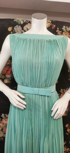 Gorgeous spring pastel green pleated Italian silk number perfect for garden parties and weddings. The belt is damaged but can be repaired, also looks great without! Across bust 18 1/2" Waist 14" Across hip 19" Length 39 1/2" Silk Pleated Dress, Tan Leather Handbags, Hair Straighteners Flat Irons, Spring Pastels, Garden Parties, Military Inspired, Pastel Green, Wool Dress, Lovely Dresses