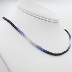 Description Whether you're looking for a pop of color for your everyday look, or you've been on the hunt for the perfect "something blue", our Beauty in Blue Choker is just what you've been searching for.Featuring over 40 carats of ombre blue and white faceted sapphire beads, this adjustable choker is a true stunner from all angles, with the heavily faceted beads catching the light at every angle. Item Details Want something a bit longer? Let us know. We can customize an ombre necklace for you i Everyday Blue Sapphire Jewelry, Blue Faceted Everyday Necklace, Everyday Blue Faceted Necklace, Sapphire Choker, Ombre Necklace, Blue Choker, Sapphire Beads, Creating Jewelry, Blue Ombre