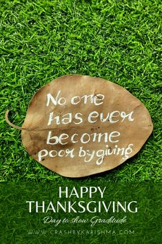 a happy thanksgiving card with a leaf on green grass and the words happy thanksgiving giving