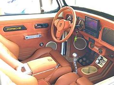 an interior view of a car with the dashboard and steering wheel in position to be adjusted