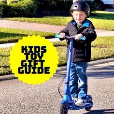 a young boy riding a scooter with the words kids toy gift guide on it