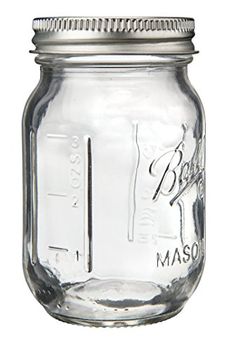 a glass mason jar with a metal lid