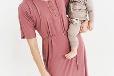 Designed perfectly for you to wear out for any occasion or for a cuddly night in, you will love this dress! Made from our original soft fabric blend, you won't want to take it off. Functional top button hides zipper for nursing mamas. Tie matches dress material and can be secured around mid-section for a fitted-look or removed for a loose, relaxed look (we love it both ways!) Modest Nursing Dresses, Maternity Sewing, Nursing Gown, Tout Rose, Tie Matching, Nursing Wear, Maternity Nursing Dress, Lounge Dress, Nursing Dress