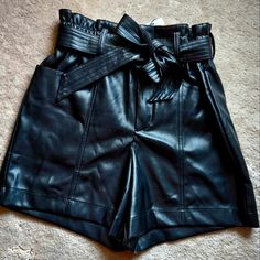 Nwt Size Xs Black Current Air Faux Leather Paper Bag Shorts. Comes From A Smoke-Free, Pet Friendly Home. Black Faux Leather Shorts With Pockets, Black Leather Shorts For Going Out, Faux Leather Paper, Paper Bag Shorts, Chambray Shorts, Tie Shorts, Belted Shorts, Ruffle Shorts, Knit Shorts