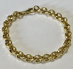 "Sleek and modern 14k yellow gold fancy cut bracelet!  ERA - Modern  METAL / MATERIAL - 14k yellow gold MARKINGS / HISTORY - Bracelet clasp is marked \"14k Italy\" CONDITION - Great condition.  SIZE / MEASUREMENTS - Length: 8 1/2 inches, Width: 9 mm, Weight: 12.15 grams" Cable Bracelets, Dark Copper, Gold Link, Bracelet Clasps, Metal Material, Chain Link Bracelet, Link Bracelets, Chain Link, Locket