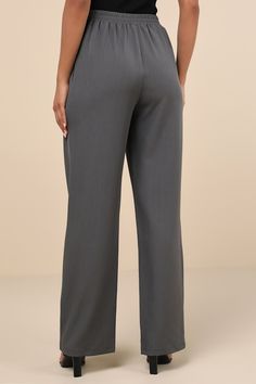 From everyday outfits to dressed-up days, the Lulus Simply Poised Charcoal Grey Twill Wide Leg Pants are a perfect shortcut to chic style! Slightly stretchy twill shapes these versatile pants with a high, elastic waist and a tying detail at the front. Subtle pleating lends a chic effect, atop wide pant legs with side seam pockets and ankle-length hems. Fit: This garment fits true to size. Length: Floor length. Waist: Fitted - elastic waist allows stretch. Hip: Loosely Fitted. Fabric: Fabric has Non-stretch Straight Dress Pants, Elegant Non-stretch Gray Bottoms, Solid Color Straight Dress Pants For Business Casual, Non-stretch Gray Wide Leg Workwear Pants, Gray Non-stretch Wide Leg Workwear Pants, Gray Non-stretch Wide Leg Pants For Work, Elastane Straight Work Pants For Office, Business Casual Ankle-length Pants In Solid Color, Elegant Wide Leg Chinos With Pockets