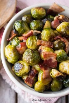 brussel sprouts with bacon in a white bowl