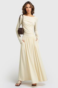 This dress is an elegant maxi dress that offers a blend of comfort and style. It features long sleeves, providing both warmth and a classic aesthetic. The ruched design on the bodice adds a unique textural element, enhancing the silhouette. The boat neckline adds an elegant touch, beautifully framing the collarbone. Made from stretchy fabric, this dress ensures comfort while maintaining its stylish appeal.Fabric: Cotton, Polyester, Elastane Ruched Maxi Dress, Classic Aesthetic, Elegant Maxi Dress, Long Sleeve Gown, Ruched Midi Dress, Trendy Fall Outfits, Boat Neckline, Flowy Skirt, The Boat