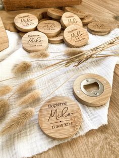 personalized wooden coasters with names and date engraved on them, sitting on a table