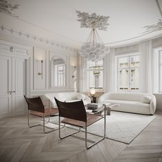 an elegant living room with white furniture and chandelier