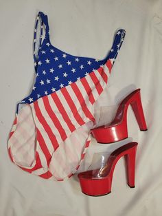 Vintage 1980s/90s American Flag swimsuit  Label Carabella size 11 Fits like a small/medium Overall good vintage condition with signs of wear and minor imperfections  See photos for details  Questions welcome  Please note that all sales are final  Model measures 34B 28W 38H for reference and swimsuit fit well Red Fitted Leotard For Summer, Retro One-piece Summer Bodysuit, American Flag Swimsuit, Blue Bathing Suit, One Piece For Women, Red White Blue, Bathing Suit, One Piece Swimsuit, Halloween Shopping