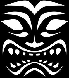 a black and white image of a mask with fangs on it's face, in the shape of a demon