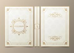 an open white book with gold trimmings on the front and back cover is shown