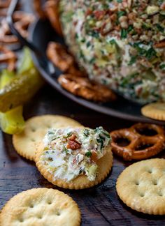 crackers, pretzels and other snacks are on the table