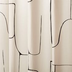 the curtain is drawn with black lines on white fabric, and it looks like an abstract drawing