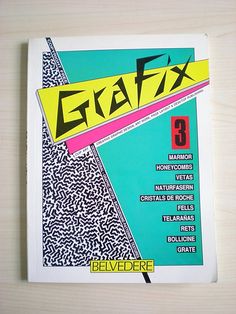 a book with the title'graffix 8'written in black and yellow