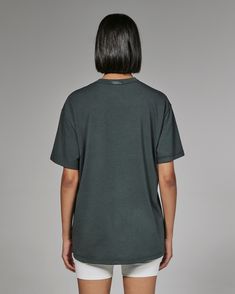 An oversized 4-way stretch cotton tee made intentionally boxy, with the perfect amount of slouch. Wear it with shorts or your favorite pair of jeans. Details Model is 5'9" and wears a size small. Care: Turn inside out. Machine wash cold on delicate cycle with similar colors. Tumble dry on low. Iron on low if needed. Composition: 57% Cotton | 38% Modal | 5% Spandex Jeans Details, Boyfriend T Shirt, Boyfriend Tee, Low Iron, Wear It, Lifestyle Brands, Stretch Cotton, Basil, Cotton Tee