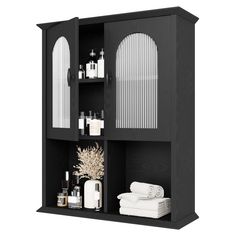 an open cabinet with towels and other items on the shelves in black wood finish, isolated against a white background