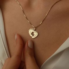 Celebrate motherhood with our Personalized First Time Mom Necklace. This beautiful piece of jewelry features a delicate baby footprint pendant, customizable with your baby's name. Perfect for first-time moms, as a push present, or as a special Christmas gift. Cherish the memories of your little one with this meaningful necklace. + How to Order1 : Choose necklace size: 2: Choose Material: 925 Sterling Silver, 14K Gold Filled, 14K Rose Gold Filled.3: Please send us name and date of birth so that we can engrave as shown in the listing.Birthstone is optional, please add the birthstone if you wish, otherwise we will make with no birthstone! Push Gifts For New Mom, Push Present Ideas, Personalized Jewelry For Mom, Personalised Jewellery Necklaces, Push Present, Push Presents, Baby Footprint, Meaningful Necklace, Shiny Jewelry