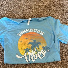 Super Cute Summer Vibes Tshirt, Never Worn Blue Slogan T-shirt For Summer, Fun Blue T-shirt With Slogan, Blue Slogan Shirt For Summer, Summer Crew Neck T-shirt With Text Print, Blue Summer T-shirt With Text Print, Blue Text Print Summer T-shirt, Blue Graphic Print Summer T-shirt, Vacation Graphic Tee With Slogan, Blue Pre-shrunk Summer T-shirt