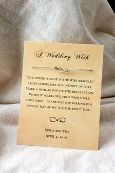 a wedding wish card with a knot on it