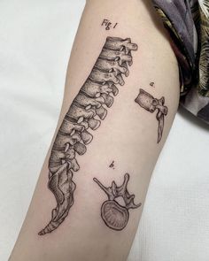 a black and white photo of a tattoo design on the left arm, with an image of a seahorse