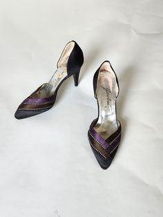 Good vintage condition Black, purple and brown satin, rhinestone trimming 5.5 ladies 8.5" toe to heel insole 3.25" heel 2.5" across ball of foot Leather sole Purple Rhinestone Pointed Toe Heels, Purple Rhinestone Heels For Formal Occasions, Purple Rhinestones Formal Heels, Purple Rhinestone Formal Heels, Purple Closed Toe Heels For Evening, Ladies Heels, Purple And Brown, Dance Heels, Womens Pumps