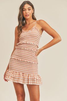 Blush Gingham Mini Dress Gingham Dress With Ruffled Hem And Straps, Spring Gingham Sundress With Ruffles, Fitted Smocked Dress For Summer Picnic, Fitted Smocked Dress With Spaghetti Straps For Spring, Spring Gingham Mini Dress With Ruffles, Flirty Smocked Dress With Ruffle Hem For Brunch, Casual Gingham Sundress With Ruffles, Summer Gingham Smocked Dress With Smocked Back, Summer Gingham Smocked Fitted Dress