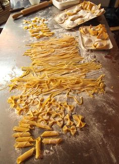 the pasta is being prepared on the table for cooking to be cooked and put in the oven