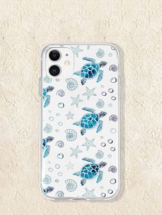 an iphone case with sea turtles and starfishs on the beach in blue tones