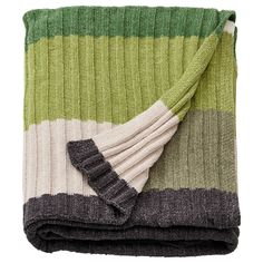 a green and grey blanket folded on top of each other