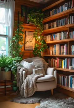 a chair in front of a book shelf filled with lots of books and plants next to a window