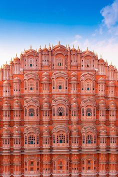 a large orange building with many windows